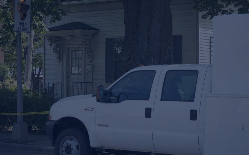 FBI evidence truck parked on a residential street