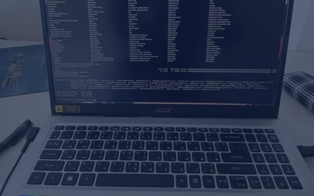 Arch Linux system update running on a laptop screen