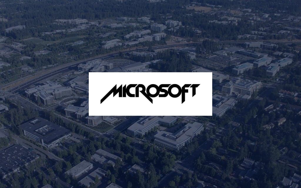 Microsoft logo over a photo of the company