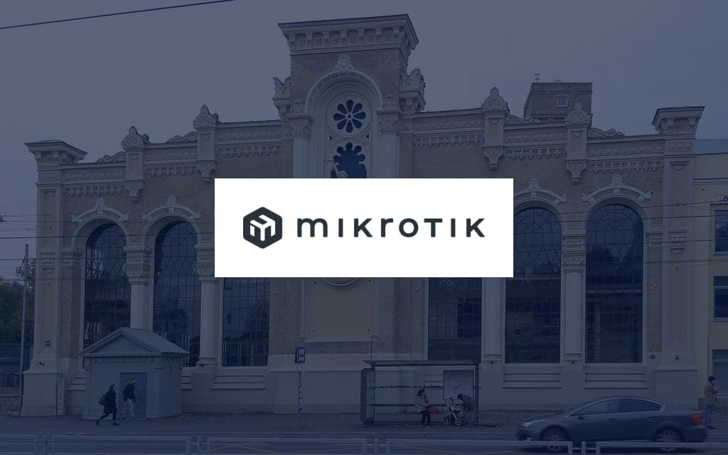 MikroTik logo over a photo of the company