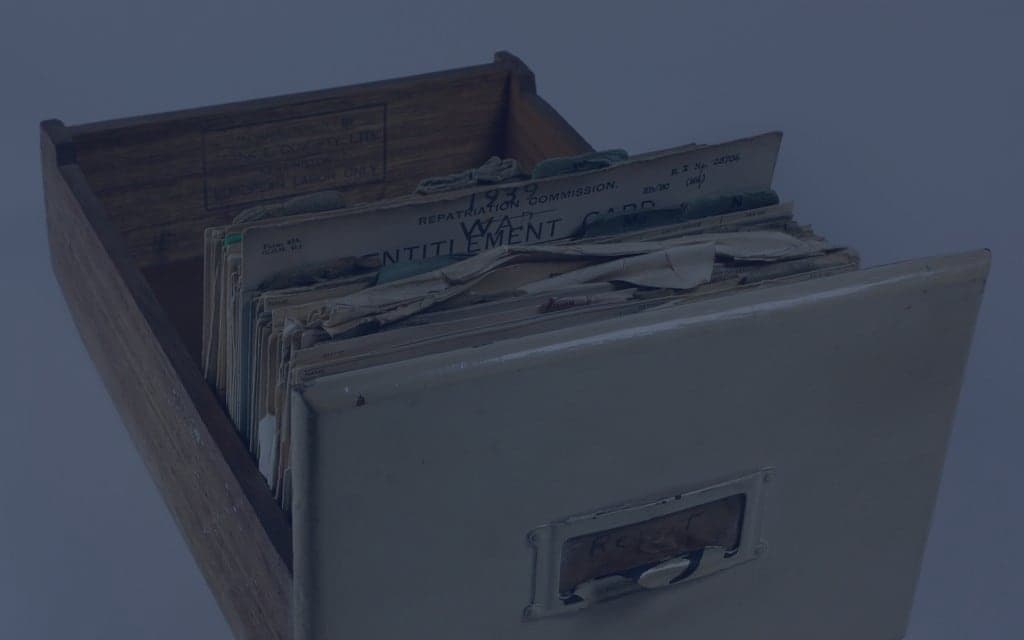 Old patient records on a desk