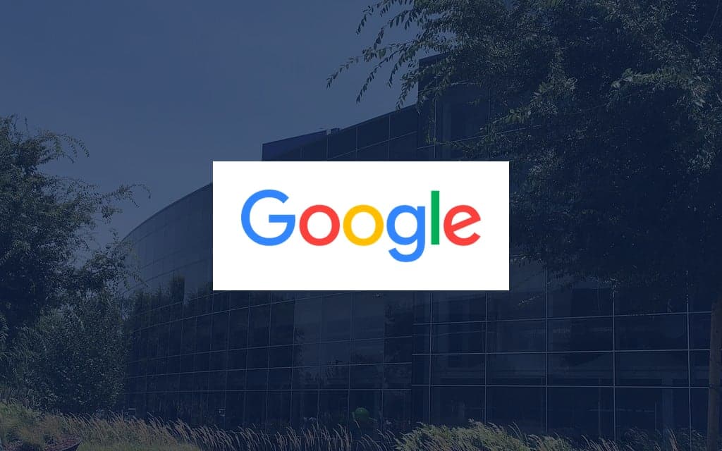 Google logo over a photo of the company