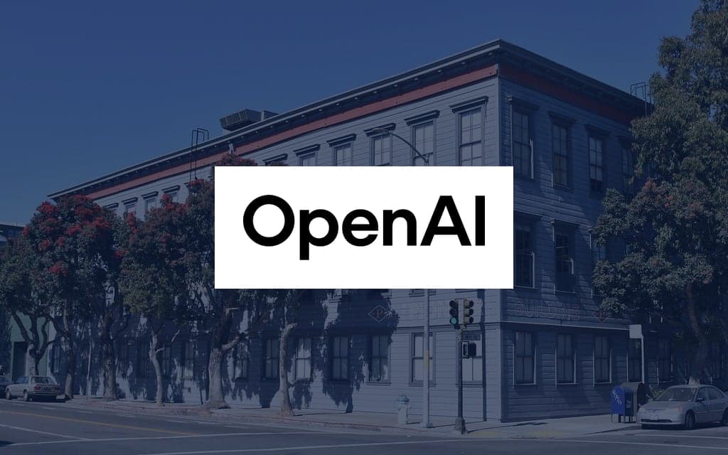 OpenAI logo over a photo of the company